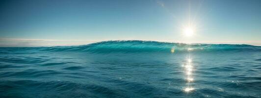 Blue ocean panorama with sun reflection, The vast open sea with clear sky, Ripple wave and calm sea with beautiful sunlight. AI generated photo