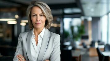 Confident and Elegant Mature Businesswoman Rocking an Expensive Suit photo