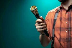 A male hand confidently holds a microphone against a vibrant blue background. AI Generated photo