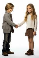 A shy child avoiding eye contact during a handshake isolated on a white background photo