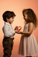 A child accepting a new baby sibling isolated on a heart shaped gradient background photo