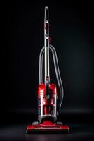 A modern professional vacuum cleaner isolated on a red gradient background photo