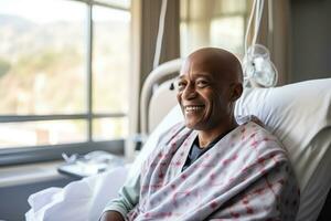 Bald man smiling in cancer hospital bed with empty space for text photo