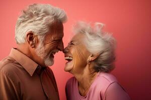 a elderly couple dancing happily and looking to each other in happiness photo