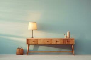 a wooden console table near a window in empty room with wallmounted photo