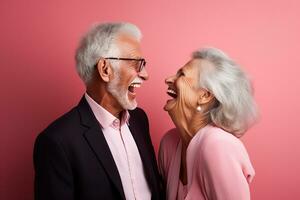 a elderly couple dancing happily and looking to each other in happiness photo