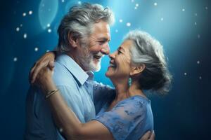 a elderly couple dancing happily and looking to each other in happiness photo