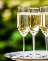 Luxury service, glasses of champagne served by a waiter at a wedding celebration or event in formal English style at luxurious hotel or country estate garden, generative ai photo