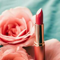 Pink lipstick in a golden tube and blooming rose flower, beauty cosmetic and make-up product, generative ai photo