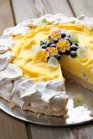 Meringue cake pudding with lemon curd sauce and berries as food, bakery and holiday baking recipe, generative ai photo