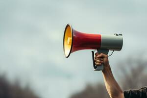 Firm grasp on megaphone, channeling fervor and determination in protest activism AI Generated photo