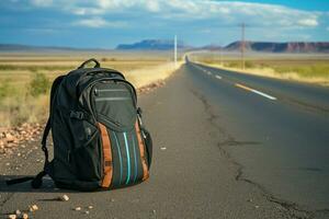 Traveler's backpack hits the asphalt road, marking the start of their adventure AI Generated photo