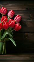 un fila de vibrante rojo tulipanes en un de madera superficie espacioso ajuste vertical móvil fondo de pantalla ai generado foto