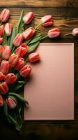 Vibrant tulips complemented by a blank paper on wooden backdrop Vertical Mobile Wallpaper AI Generated photo