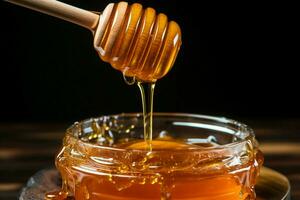 Vertical closeup honey flows from wooden stick to jar, highlighting natural purity AI Generated photo