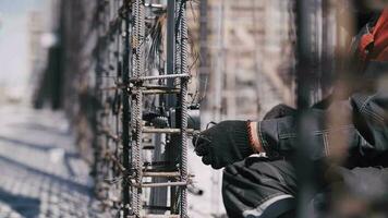 Installation of electric boxes at a construction site video