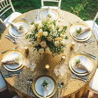 Holiday tablescape, golden formal dinner table setting, table scape with gold decoration for wedding party and event celebration, generative ai photo