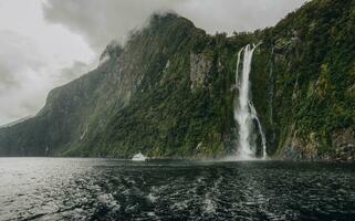 Stirling falls an iconic waterfalls in Milford Sound, New Zealand's most spectacular natural attraction in south island of New Zealand. photo