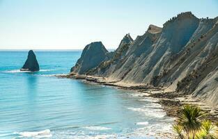 The scenery view of Cape Kidnappers an iconic famous landscape of Hawke's Bay region, New Zealand. photo