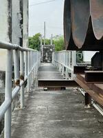 old rusty iron bridge in country Thailand photo