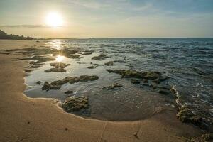 Cape Wirrwawuy of Nhulunbuy town beach in Northern Territory state of Australia at sunset. photo