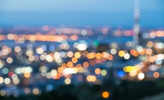 The blur bokeh city nightlife of Auckland at dusk, New Zealand. photo