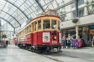 Christchurch, New Zealand - October 02 2017 - The red tram at Cathedral Junction in the central of Christchurch. photo