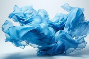 Floating blue fabric condensed and slightly reformulated Cascading azure fabric gently floats in mid air photo