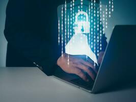 Hackers work on laptops in the dark. The concept of information security in the Internet network and information espionage. photo