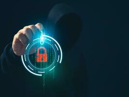 Hacker is pointing his finger at a binary code on a dark background. Concept of information security in internet networks and espionage. photo