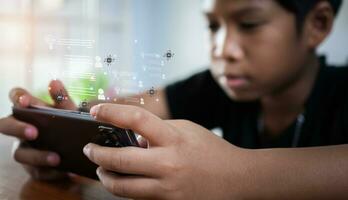 A boy's hand uses a smartphone to type live chat, ask, answer with an artificial intelligence system. chat bot. Ai. photo