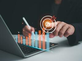 Businessman pointing to the target. Business concept. management concept business planning concept photo