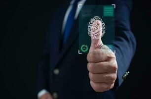 Businessman scan fingerprint biometric identity and approval. Secure access granted by valid fingerprint scan, Business Technology Safety Internet Network Concept, Business Technology Safety Internet photo