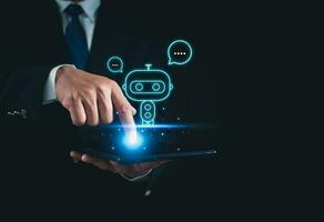 Businessman holding finger on tablet showing chat ask questions AI system, machine learning, artificial intelligence of future technology, AI brain network in business analytics. photo