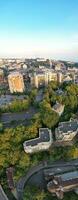 Vertical Aerial Panoramic of British Tourist Attraction at Sea View of Bournemouth City of England Great Britain UK. High Angle Image Captured with Drone's Camera on September 9th, 2023 During Sunset photo