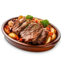 Slow cooked beef brisket with vegetables exquisitely isolated on a white background photo