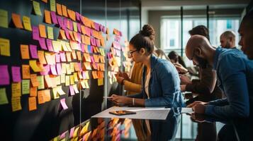 Collaboration. Group brainstorming session with sticky notes photo