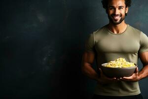 Fitness enthusiast eating post workout pasta health bar background with empty space for text photo