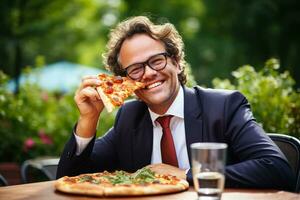 Middle aged businessman enjoying pizza lunch in park isolated on a white background photo