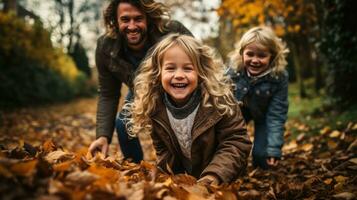 Family playing in leaves in backyard photo