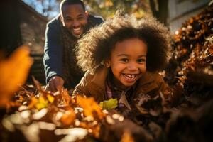 Family playing in leaves in backyard photo