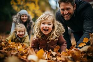 Family playing in leaves in backyard photo