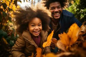 Family playing in leaves in backyard photo