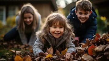 Family playing in leaves in backyard photo