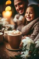 Happy family drinking hot chocolate in winter photo