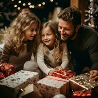 Joyful family with Christmas presents and decorations photo