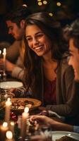 Happy friends enjoying a festive dinner together photo