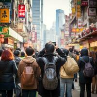 Tourists snapping photos in busy city