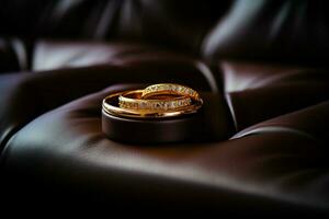 Gold rings rest on the opulent surface of a sleek leather sofa AI Generated photo