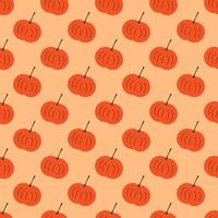 Seamless geometric pattern with orange pumpkin on light pink background. Vector print for fabric background